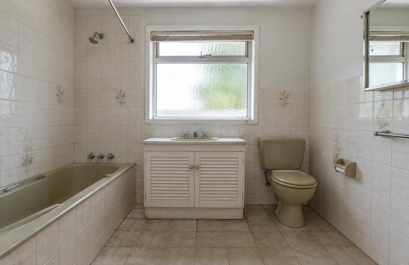Dated bathroom before renovation